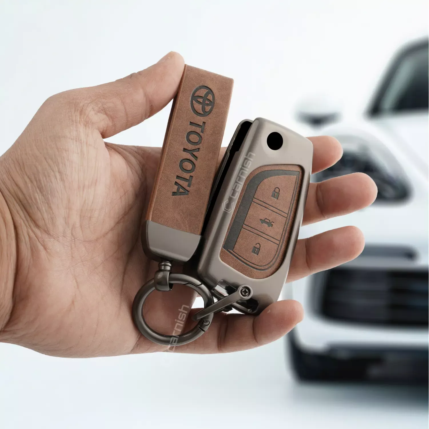 Metal Leather Brown Key Cover For Toyota: Innova Crysta, Corolla Altis 3 button flip key.